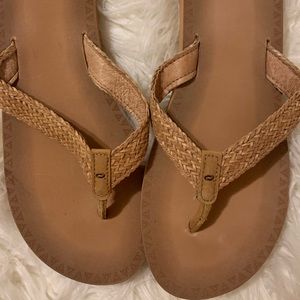 Braided sandals with cushion bottom.